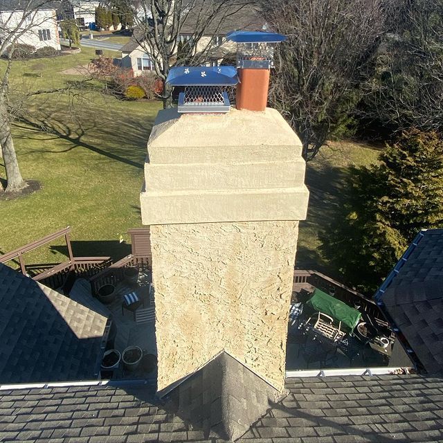 An aerial view of a chimney on a roof