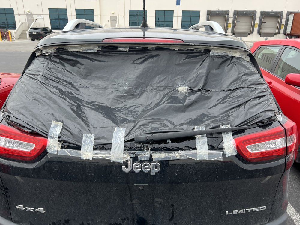 a cloth covered with car's windshield glass