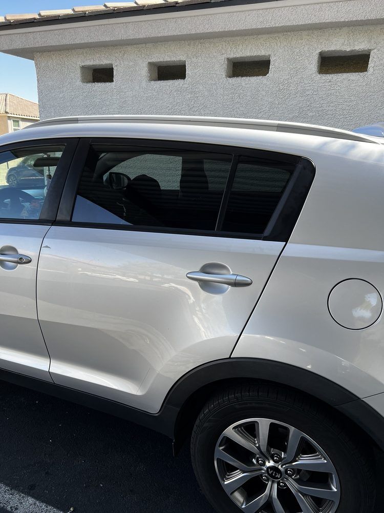 white color car with window glasses