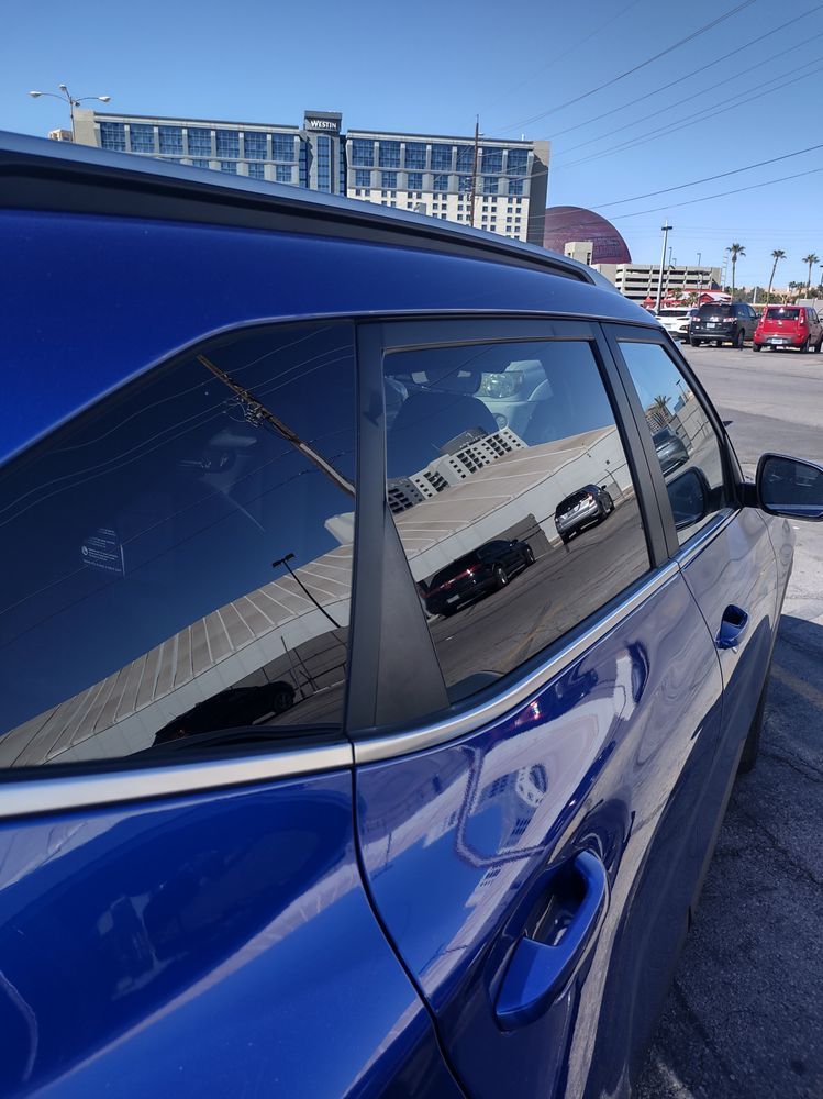 blue color car with glasses in city