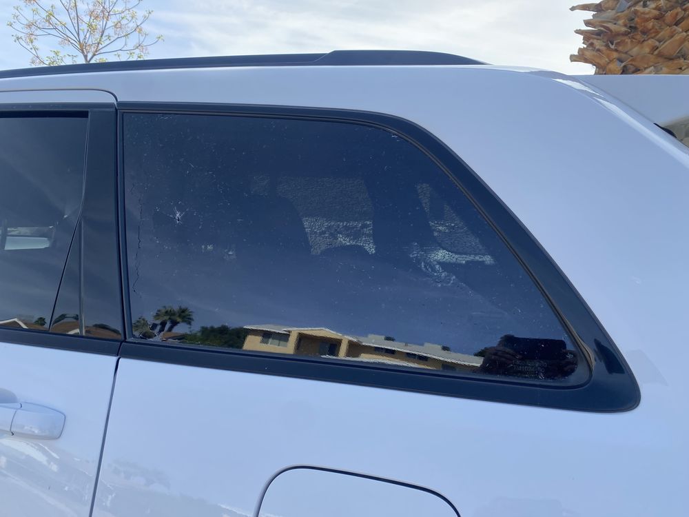 white color car with window glasses