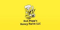 Yellow logo with chef bee holding honey and text: Don Popp's Honey Farm LLC.