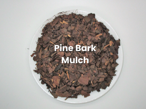 Pine bark mulch in a white container, labeled with white text.