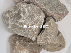 Pile of rough gray rocks with white speckles, labeled “Brassfield #2”
