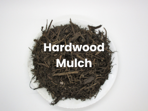 Pile of hardwood mulch on a white background with the words “Hardwood Mulch” over it