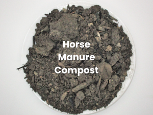 White bowl of dark soil labeled “Horse Manure Compost”