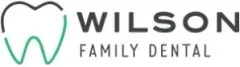 Logo for Wilson Family Dental featuring a stylized tooth icon in grey and green next to the company name.