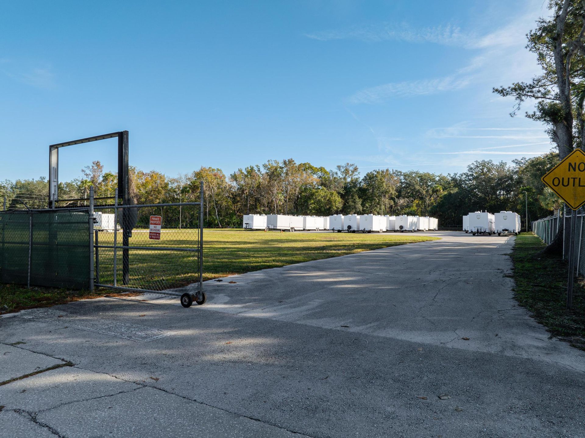 There is a no entry sign on the side of the road