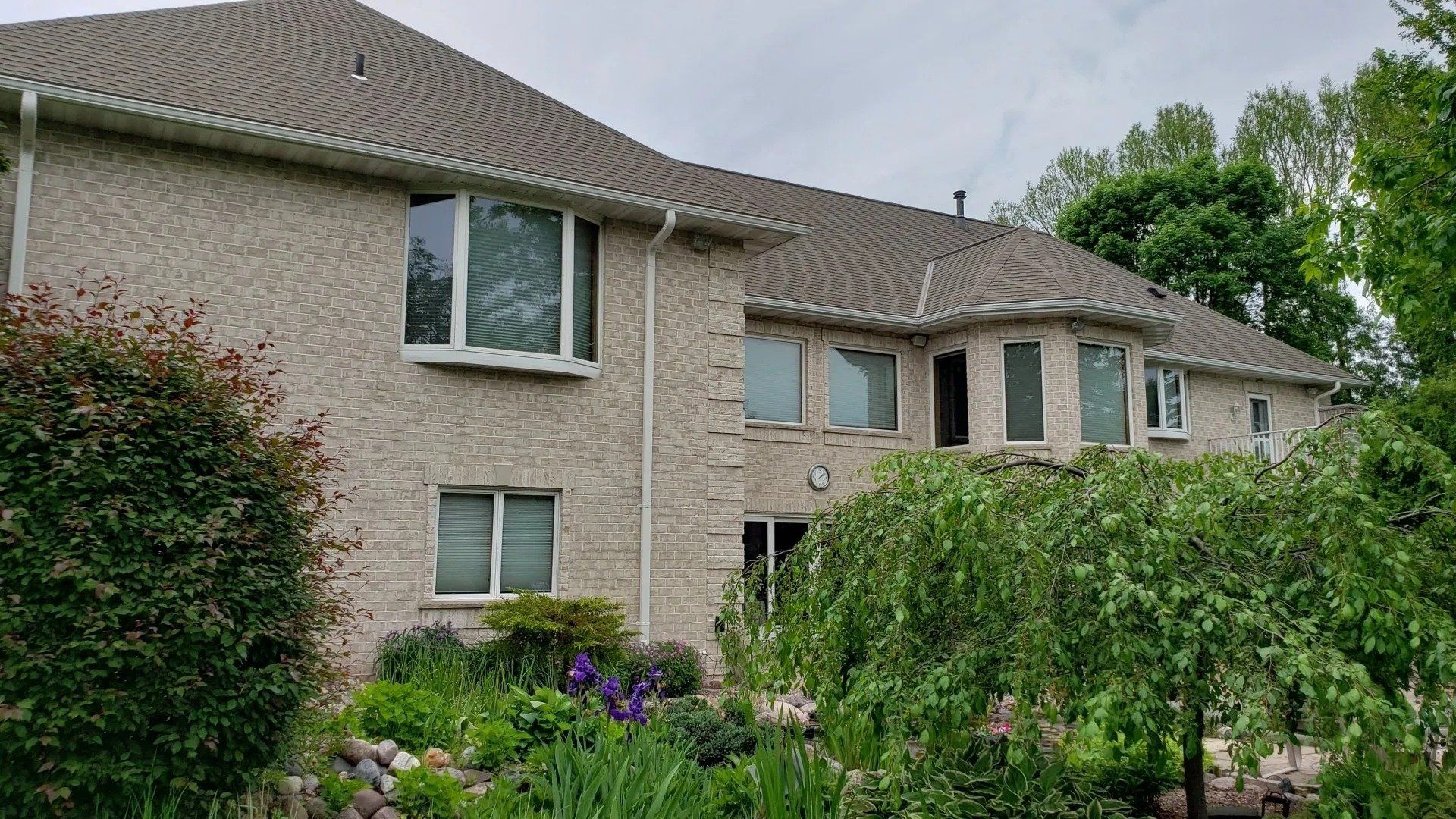 White 5 inch gutters and 3x4 downspouts