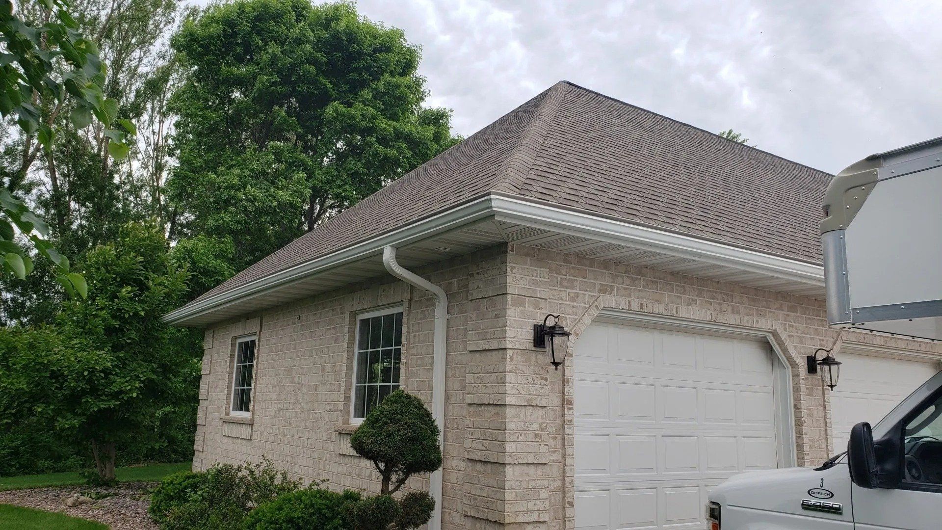 White 5 inch gutters and 3x4 downspouts