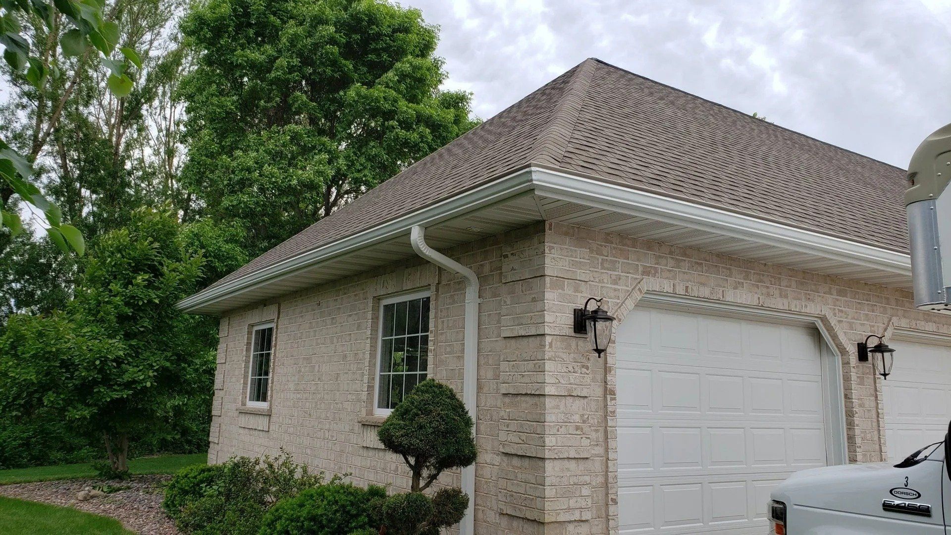 White 5 inch gutters and 3x4 downspouts