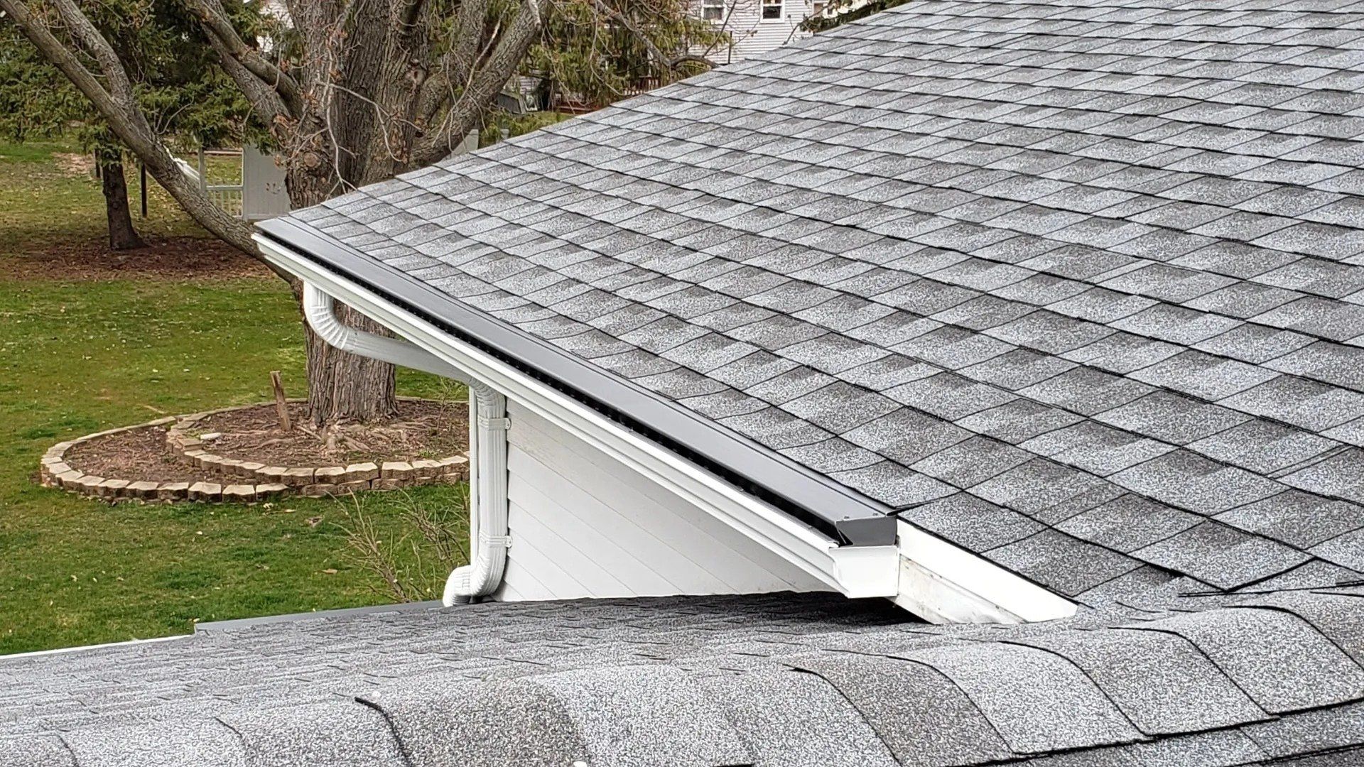Close-up of white 5 inch gutter