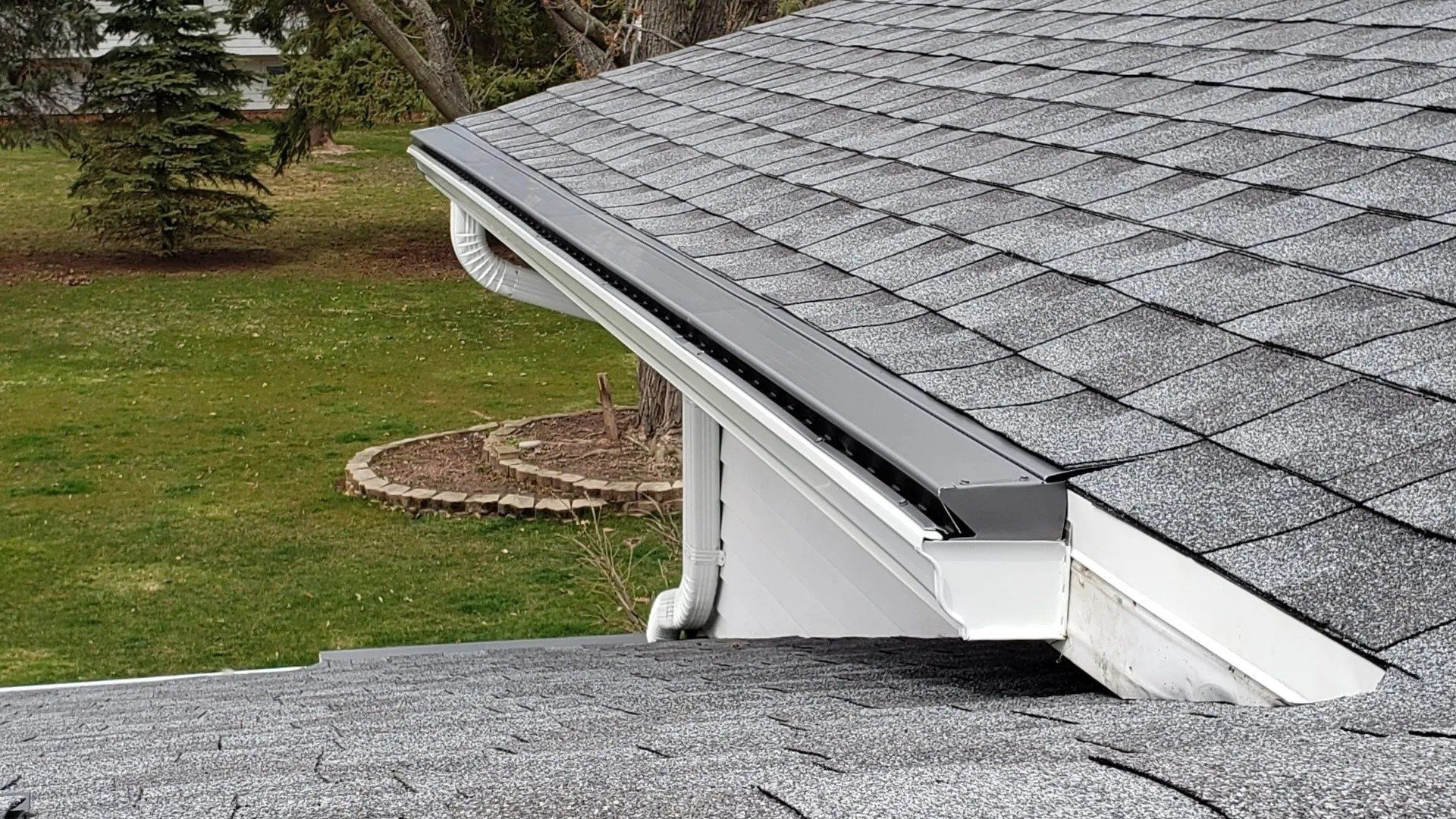 Close-up of white 5 inch gutter