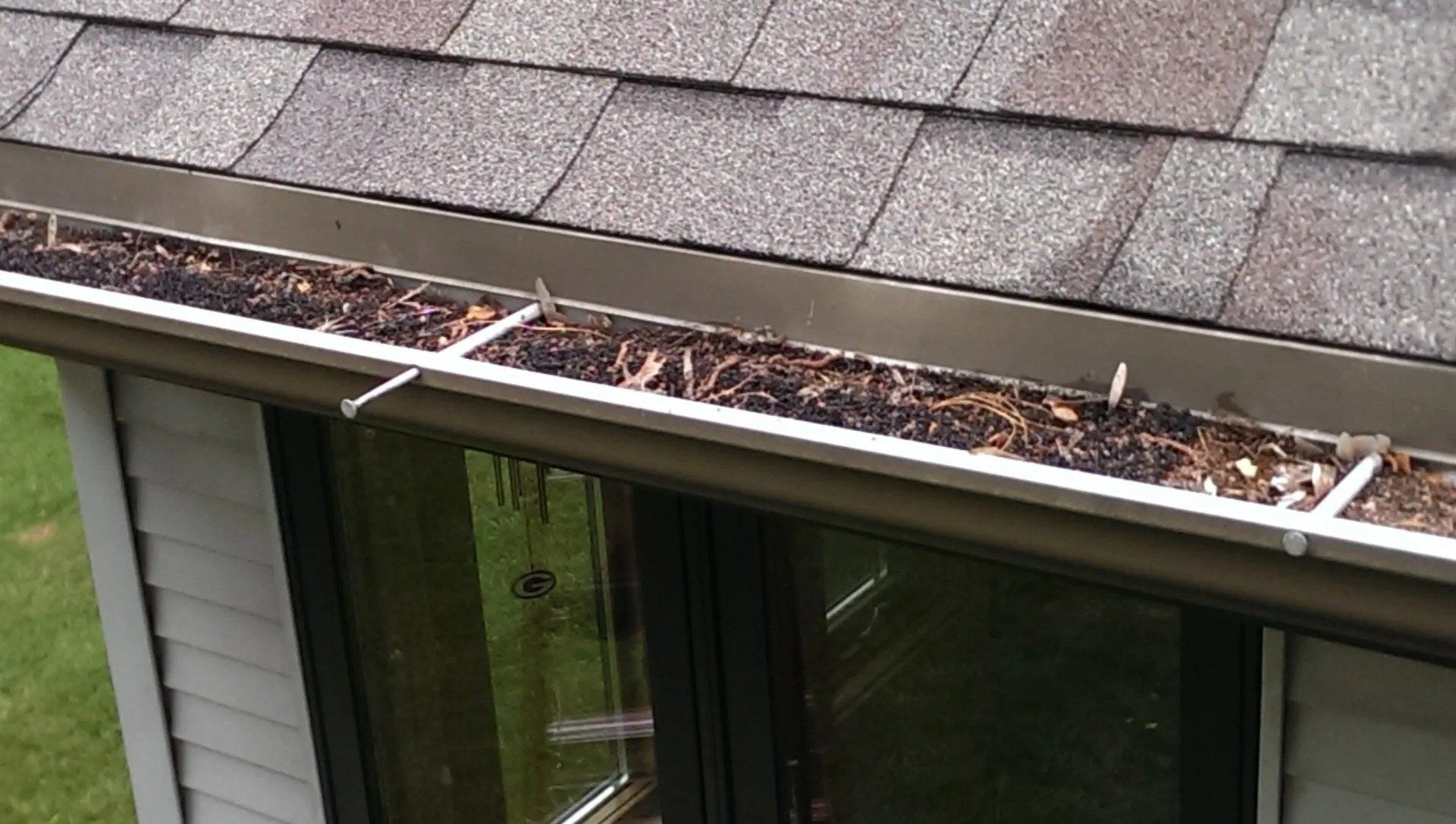 Musket Brown 5 Inch Gutter, 3x4 Downspout, and LeafX Covers (Before