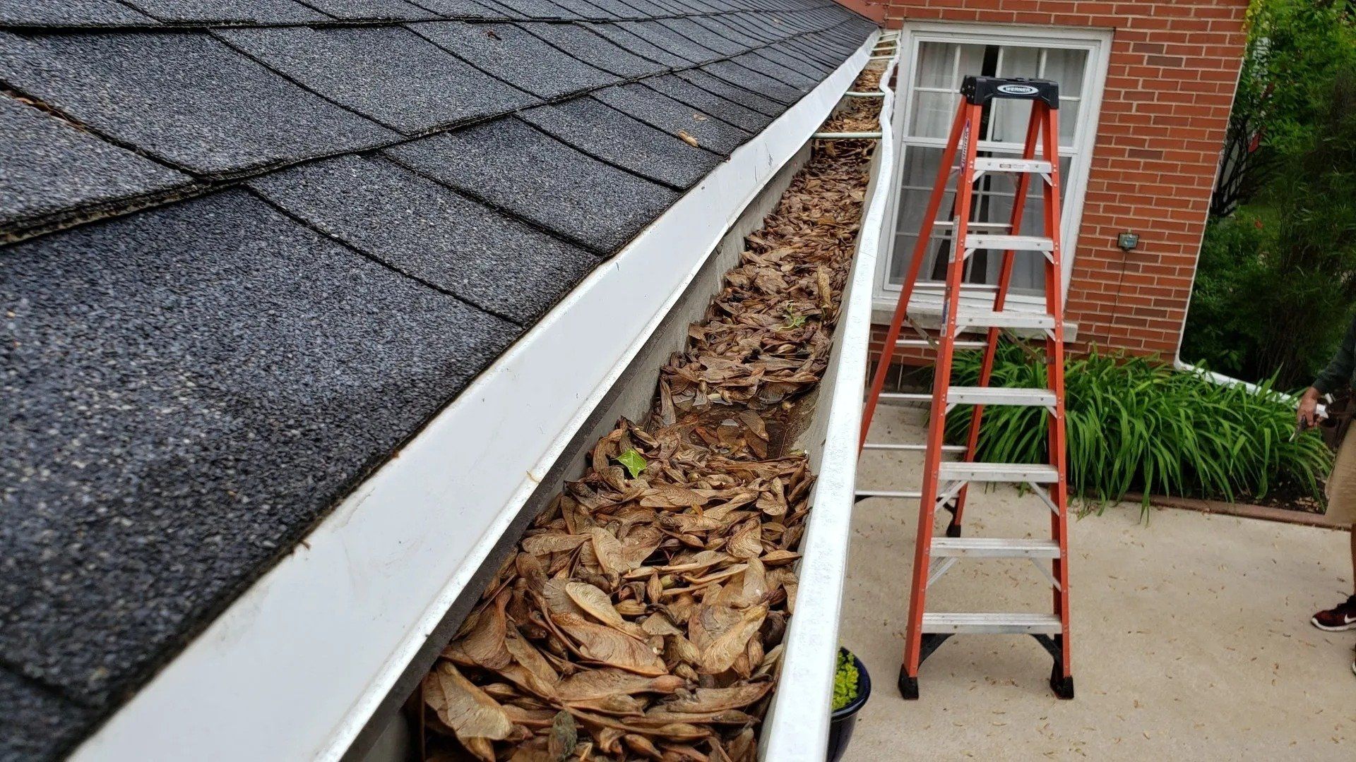 Before and after white 5 inch gutter