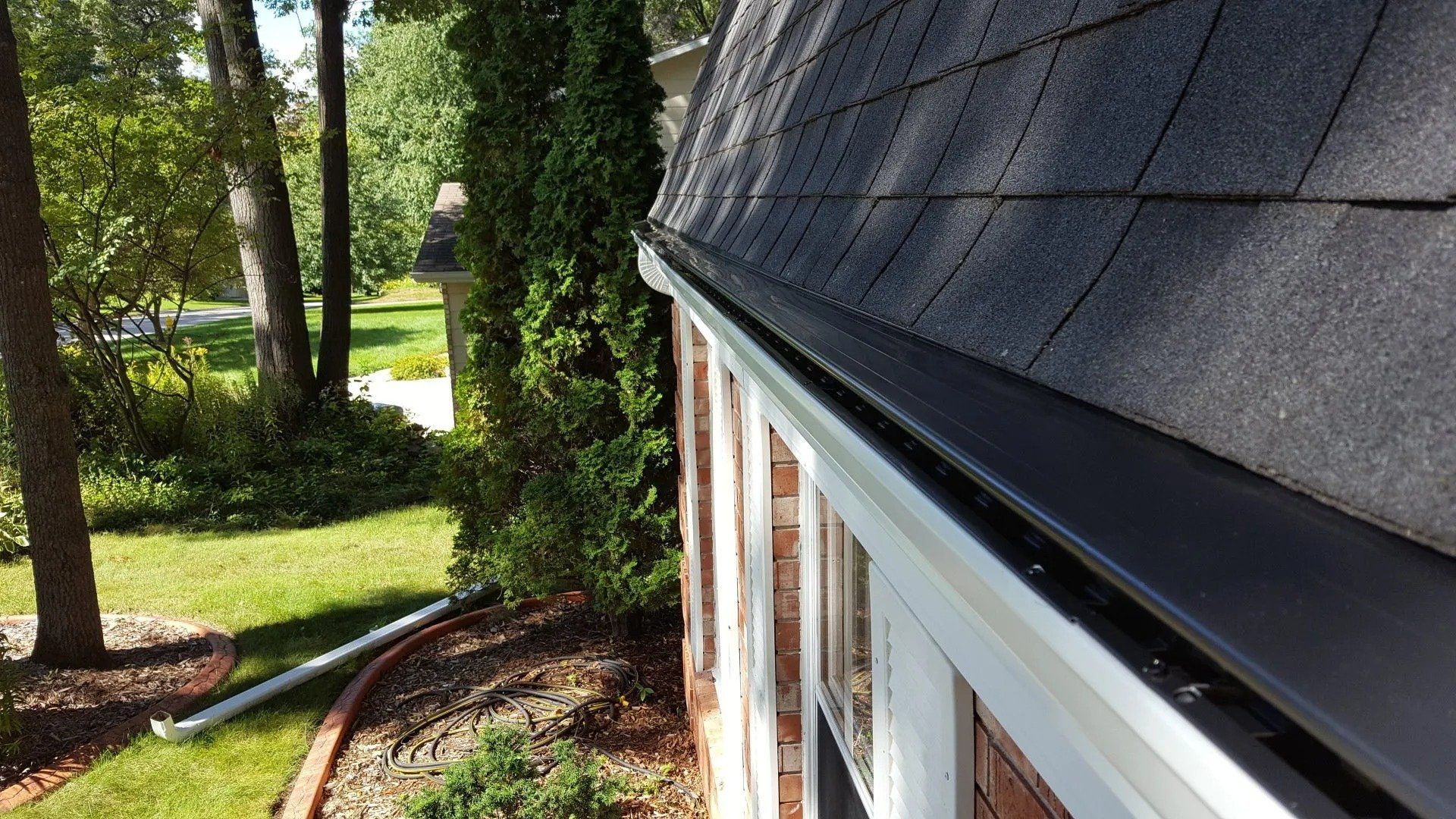 White gutter and 3x4 downspout