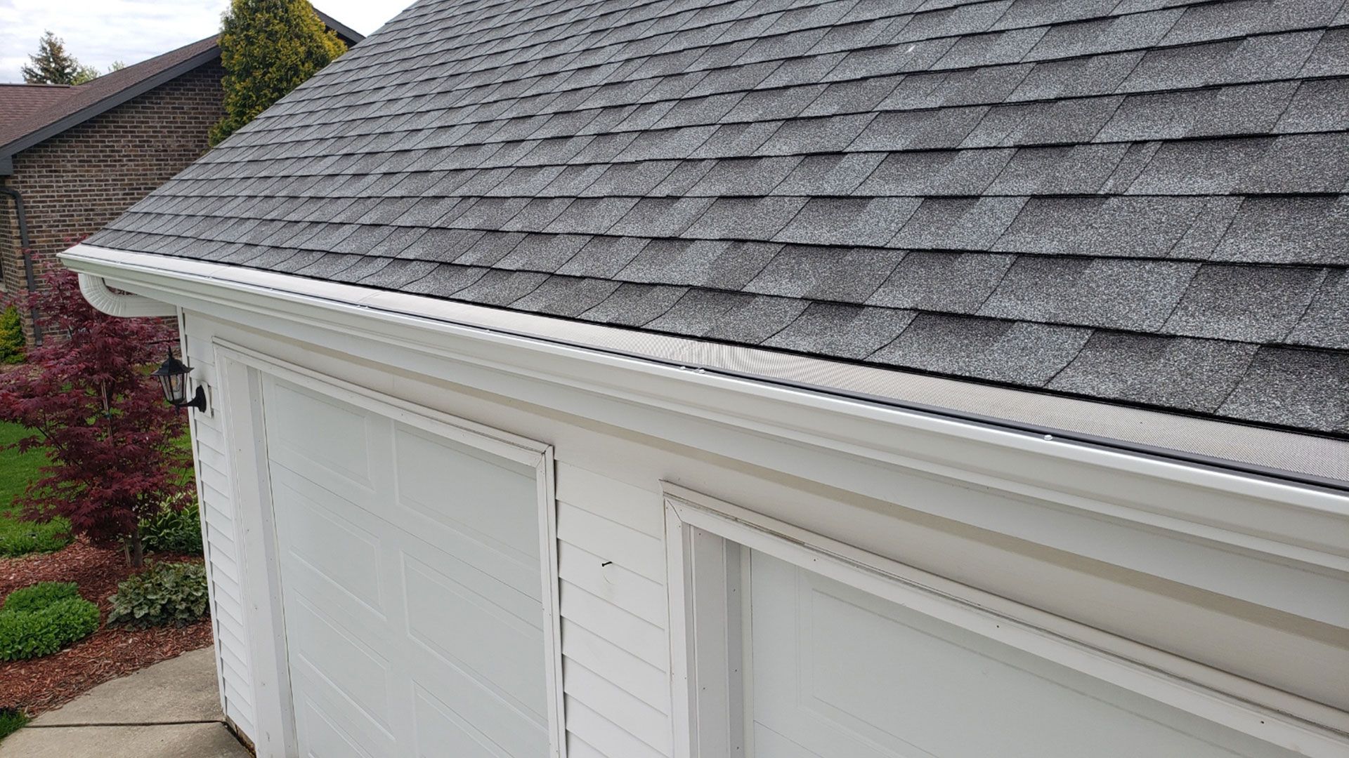 garage roof with gutter guard