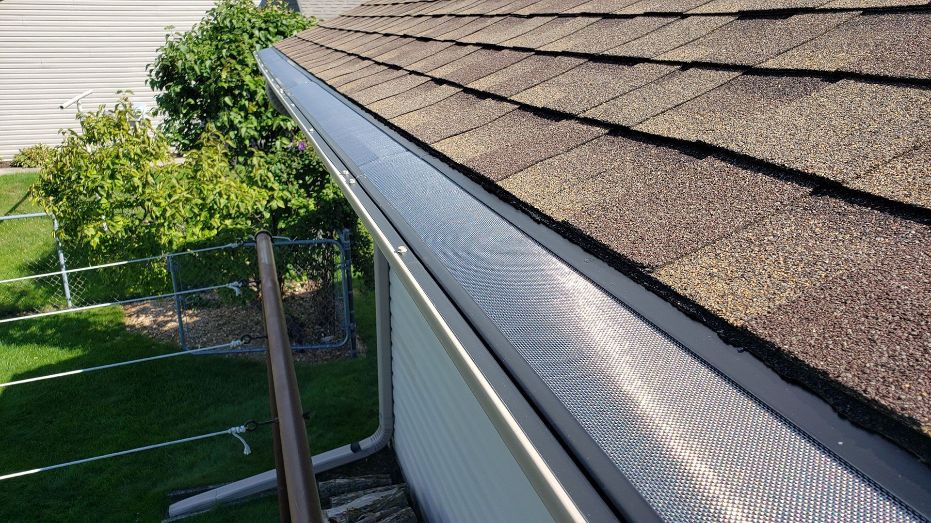 garage roof with one gutter guard