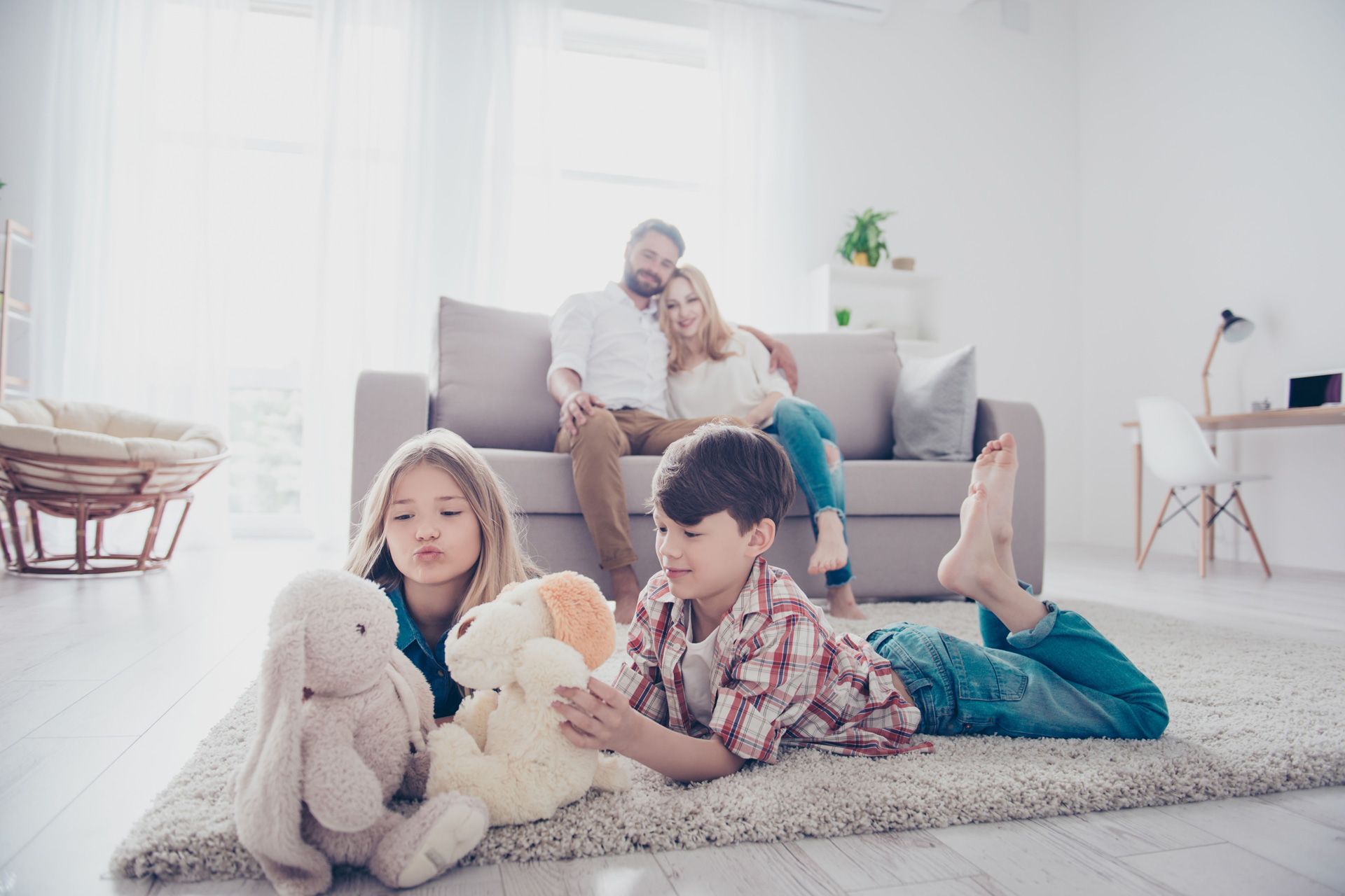 Family relaxing in a warm living room