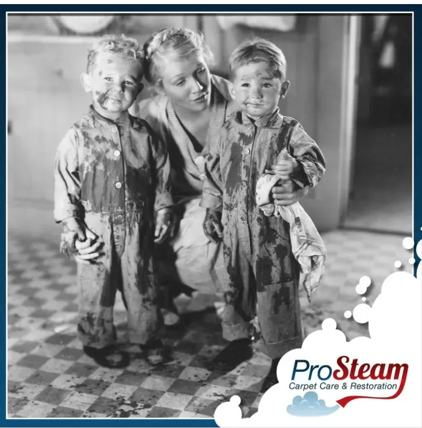 A black and white photo of a woman and two children with pro steam carpet care and restoration written on the bottom