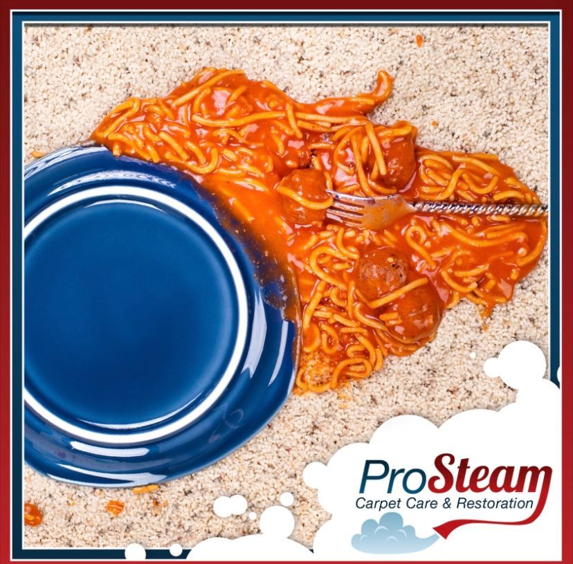 A blue plate with spaghetti and meatballs on it next to a pro steam logo