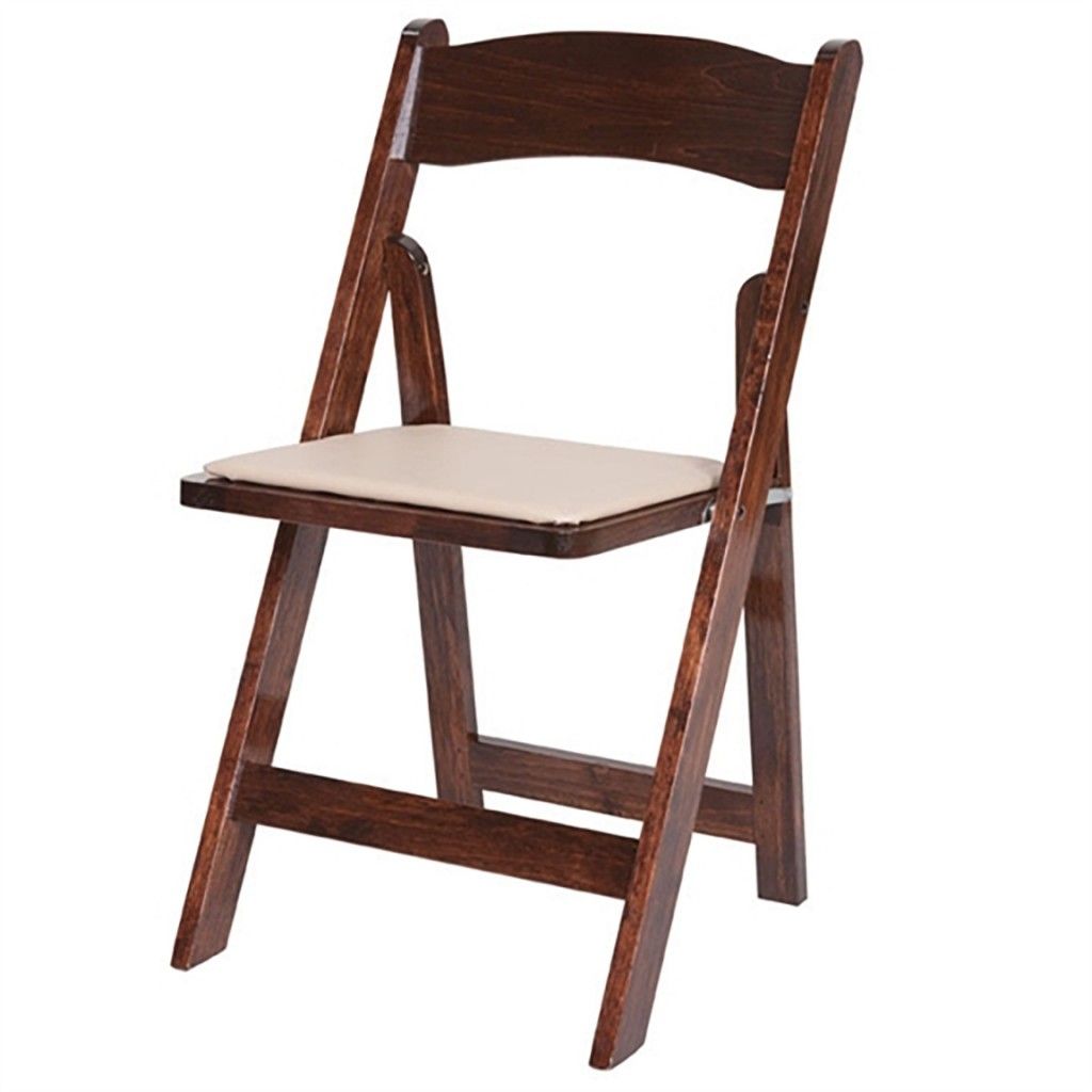 a wooden folding chair with a white cushion on a white background