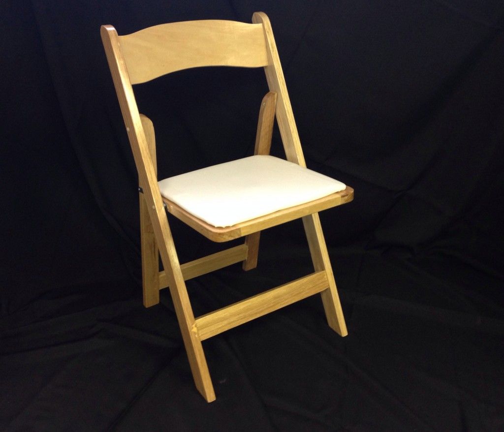 a wooden blonde folding chair