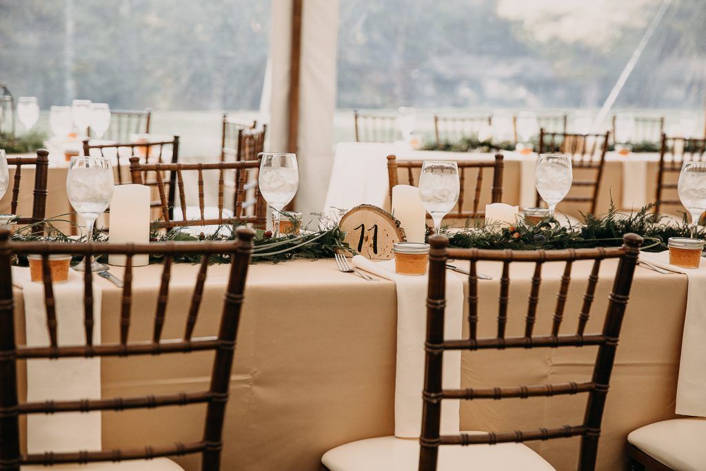 a couple of chairs sitting next to each other at a table