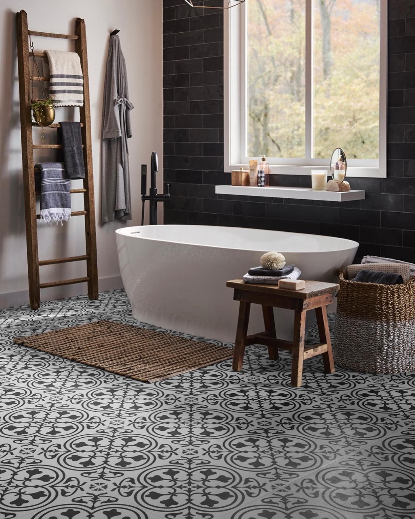 A bathroom with a bathtub and a ladder