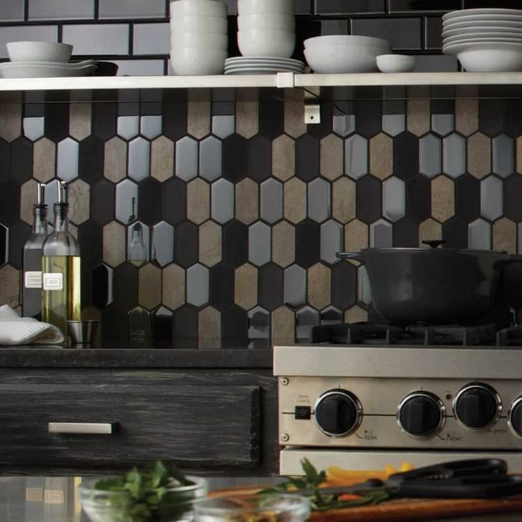 A kitchen with a stove and a pot on it