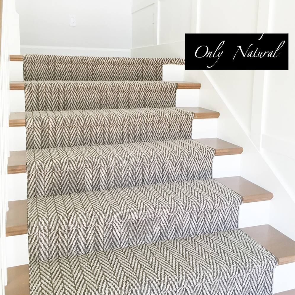 A set of stairs with a carpet on them.