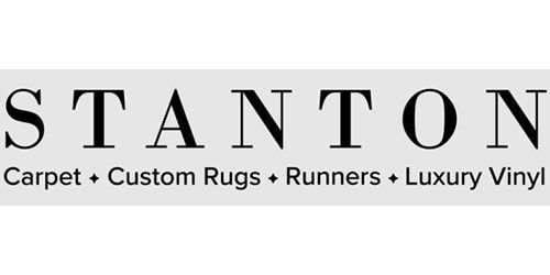 The logo for Stanton Carpet, custom rugs, runners, luxury vinyl.