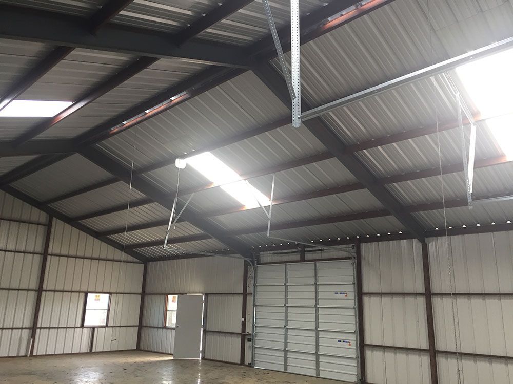 The inside of a building with a roof and a door