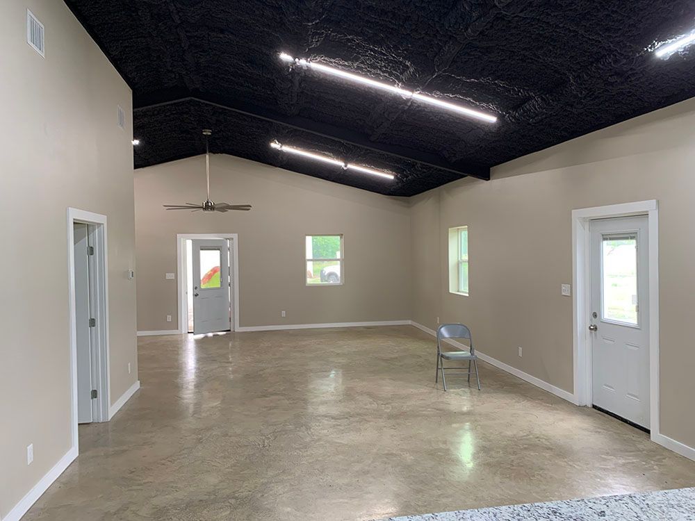 There is a chair in the middle of the room.