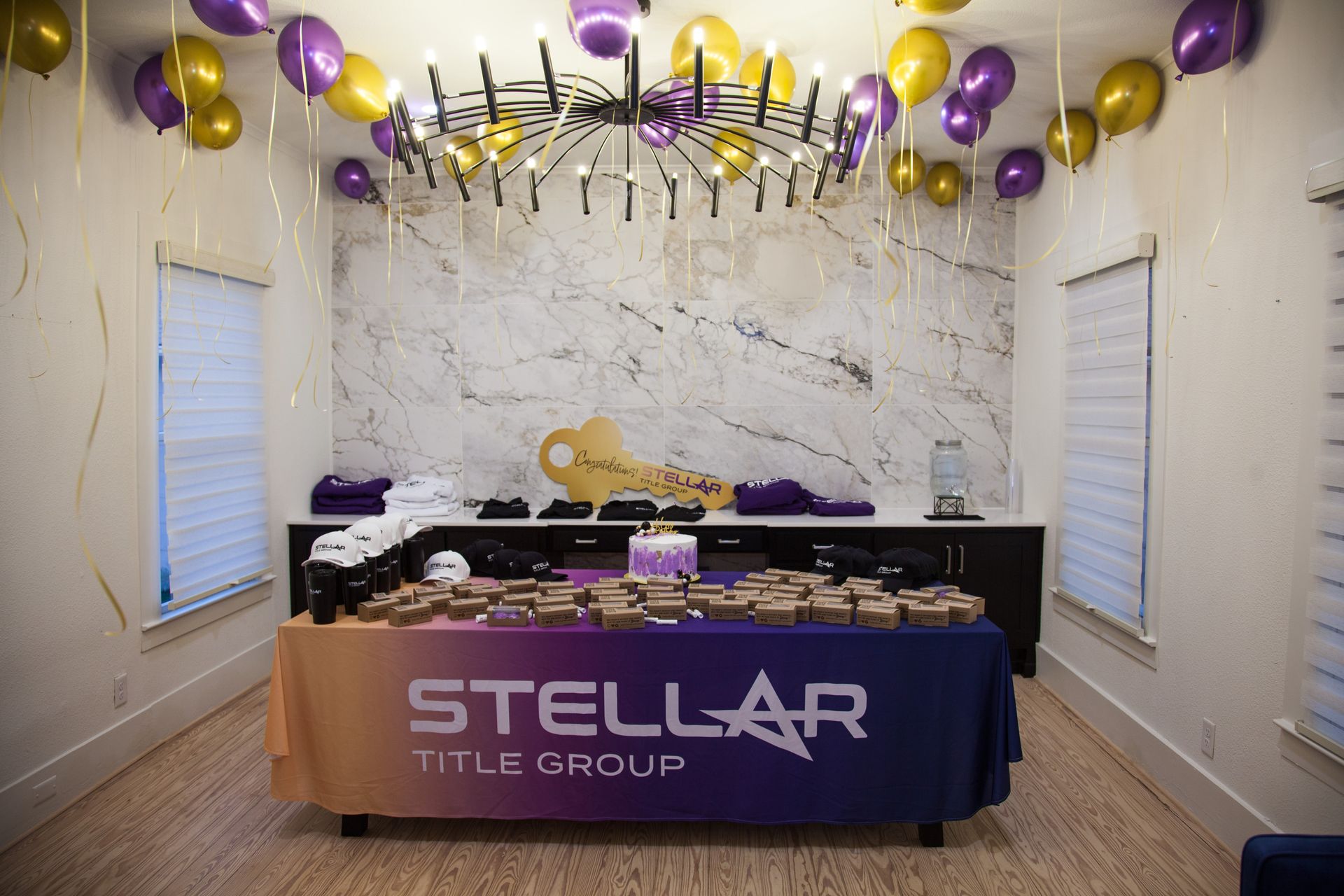 A room with a table that says Stellar Title Group on it.