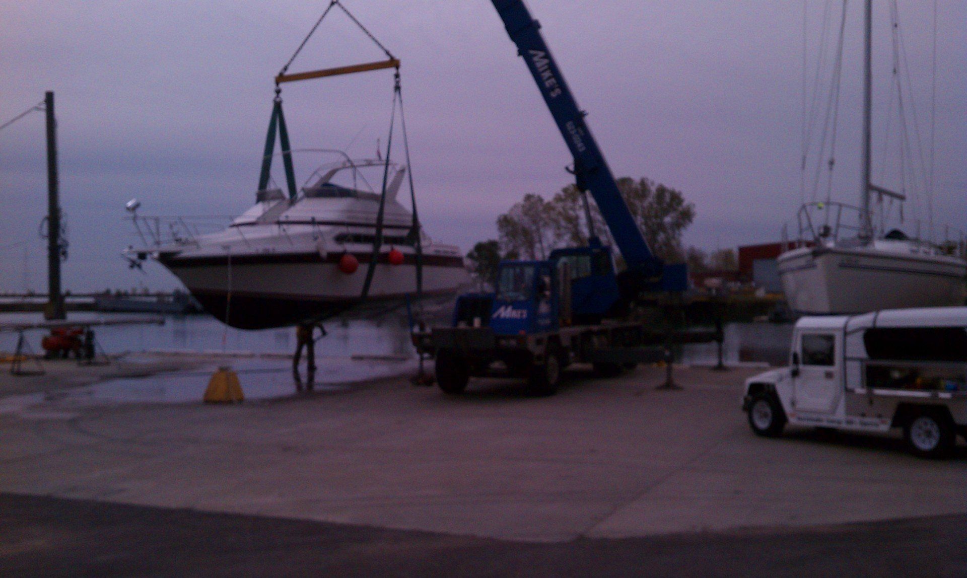 Crane lifting a boat