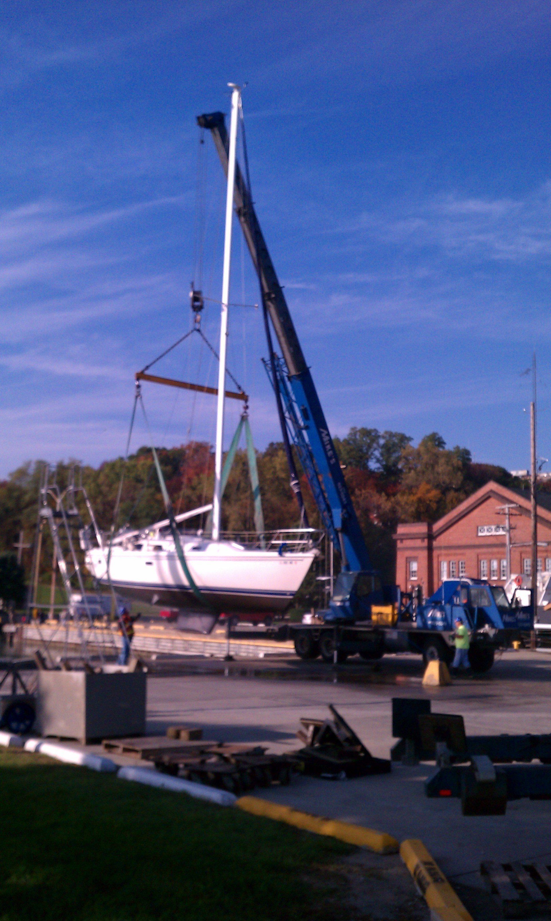 Crane lifting a boat