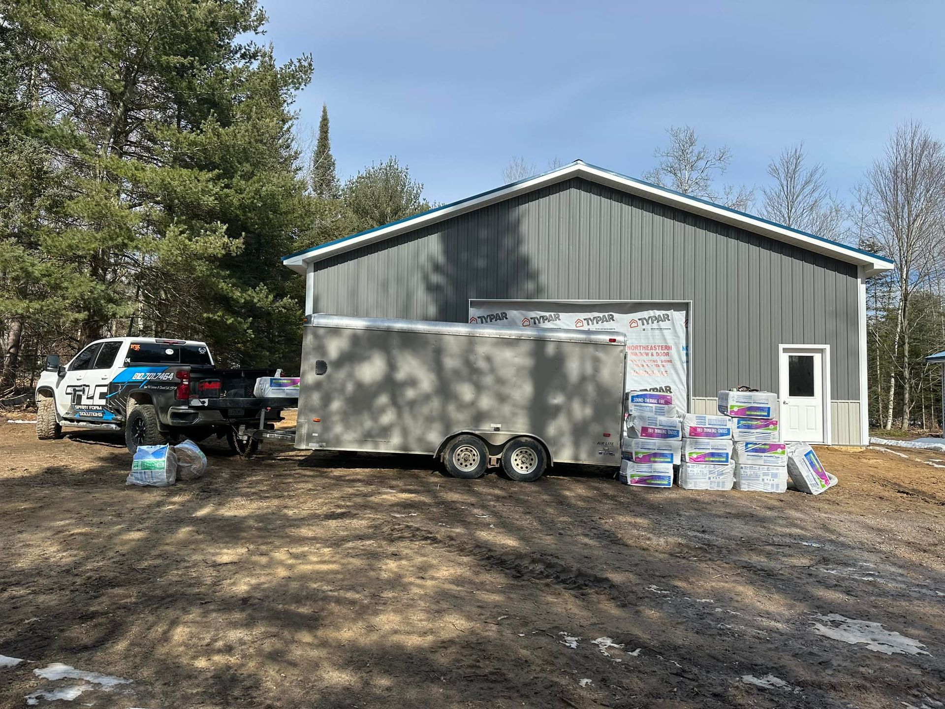a trailer is parked in front of a large building