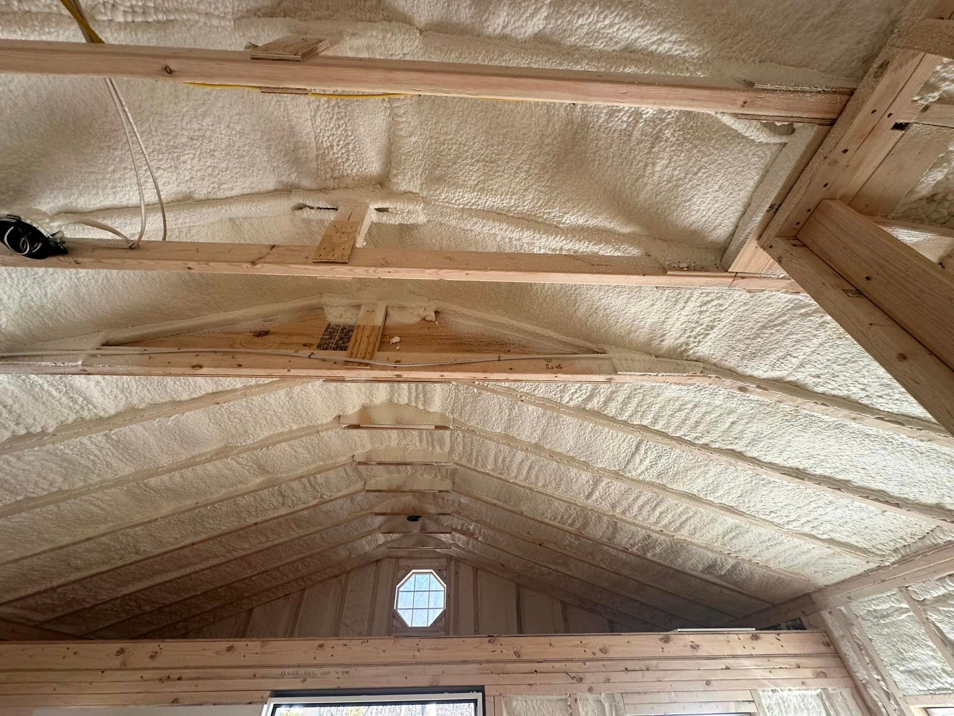 the ceiling of a building with a lot of foam on it