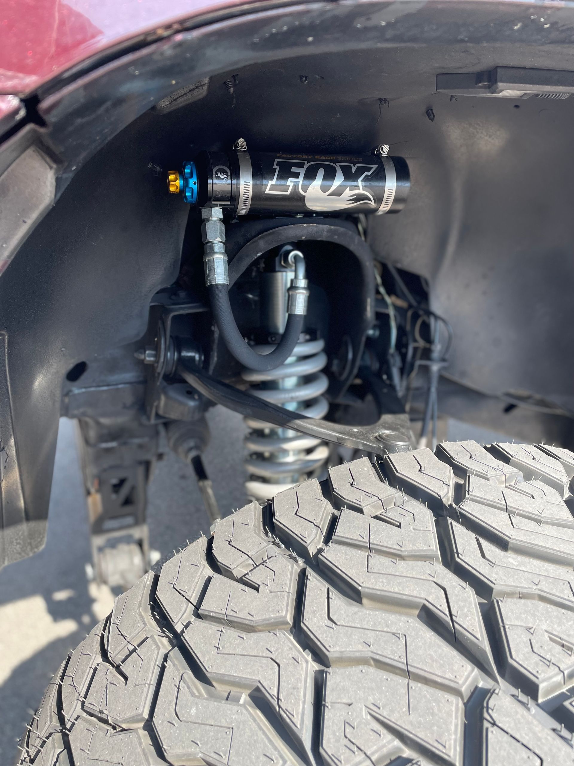 A close up of a suspension system on a truck