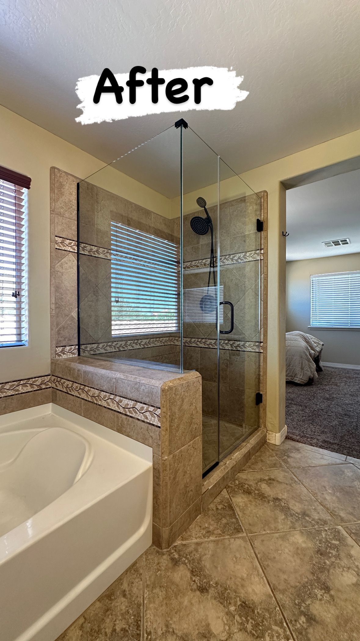 A bathroom with a bathtub and a walk in shower.