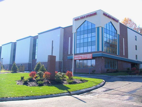 A large building with a sign that says self storage