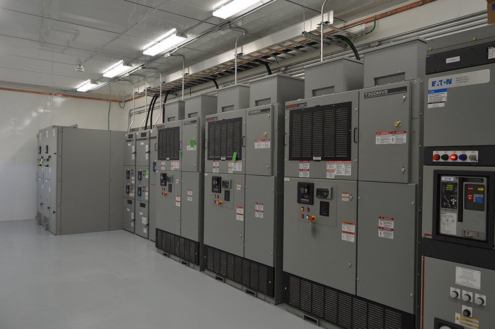 A room filled with lots of electrical boxes and switches.