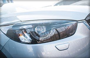 Car headlight restoration service
