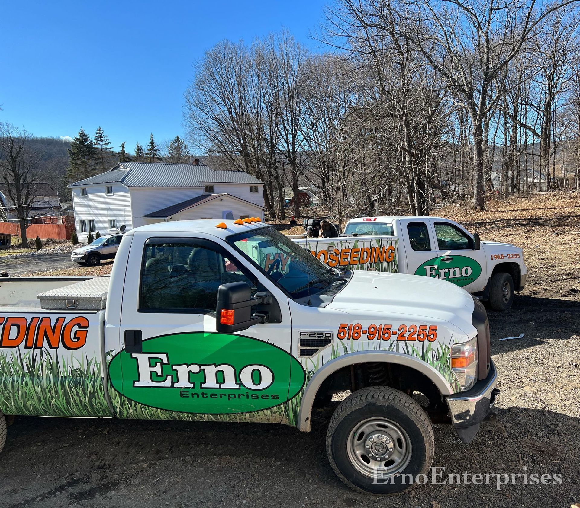 a white truck with the word erno on the side