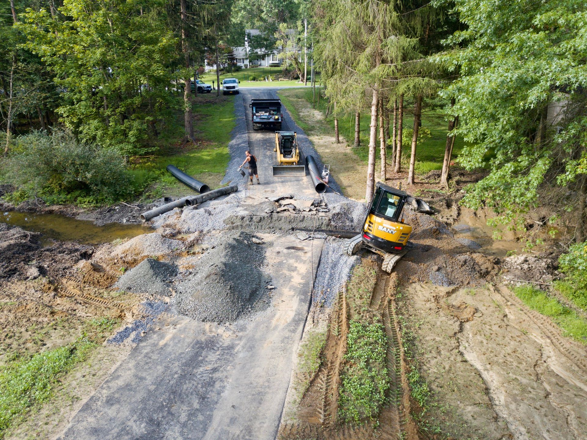 Elevated view of a construction site on a dirt road .