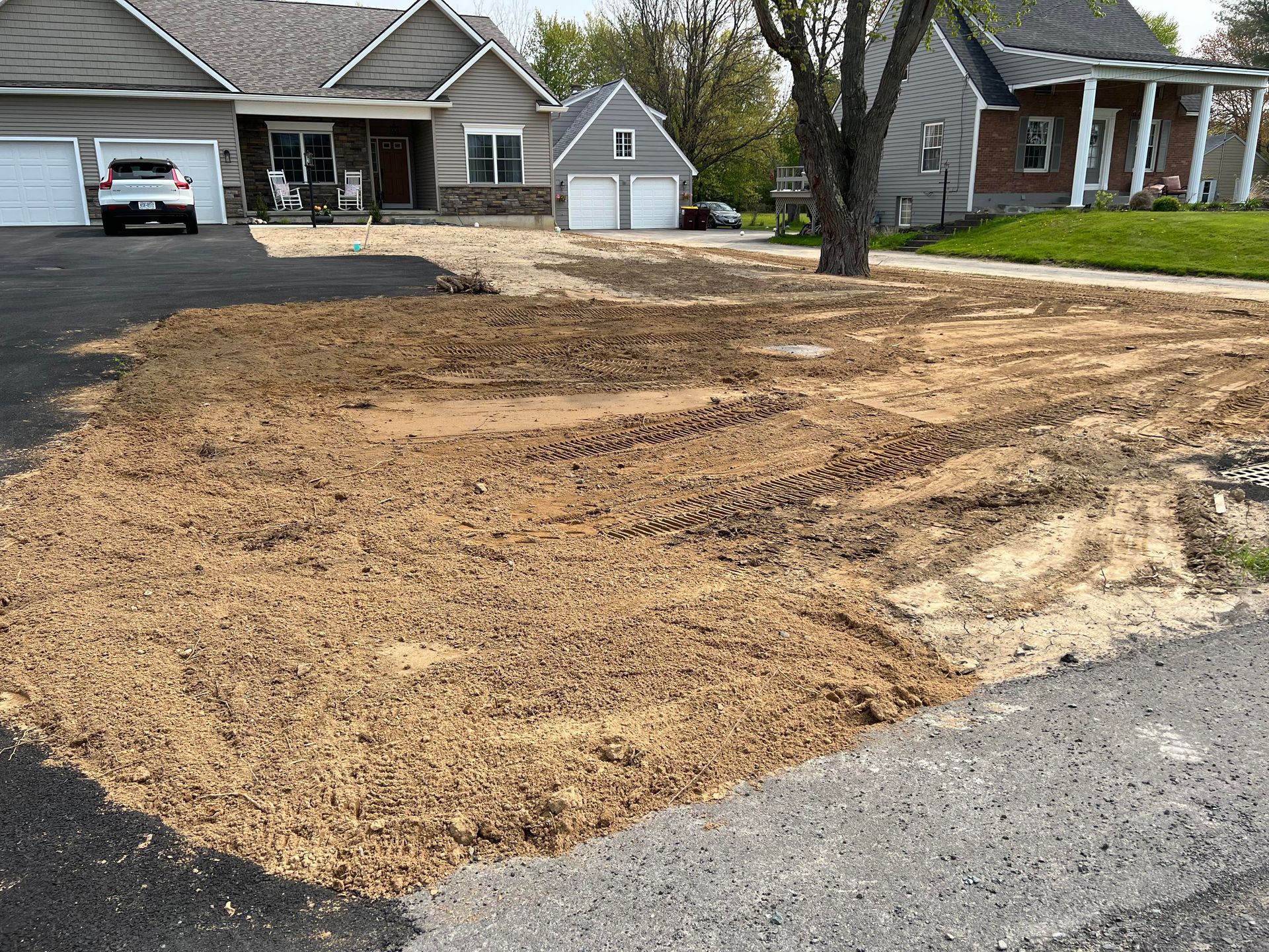 a new house on a dirt lot