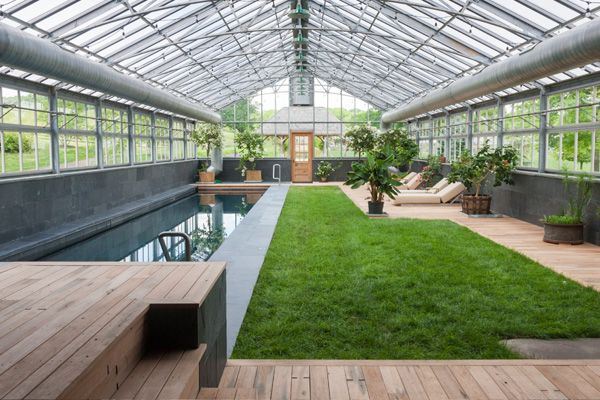 Green house with brick as base wall