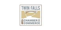 Twin Falls Area Chamber of Commerce logo with tan mountains and black text