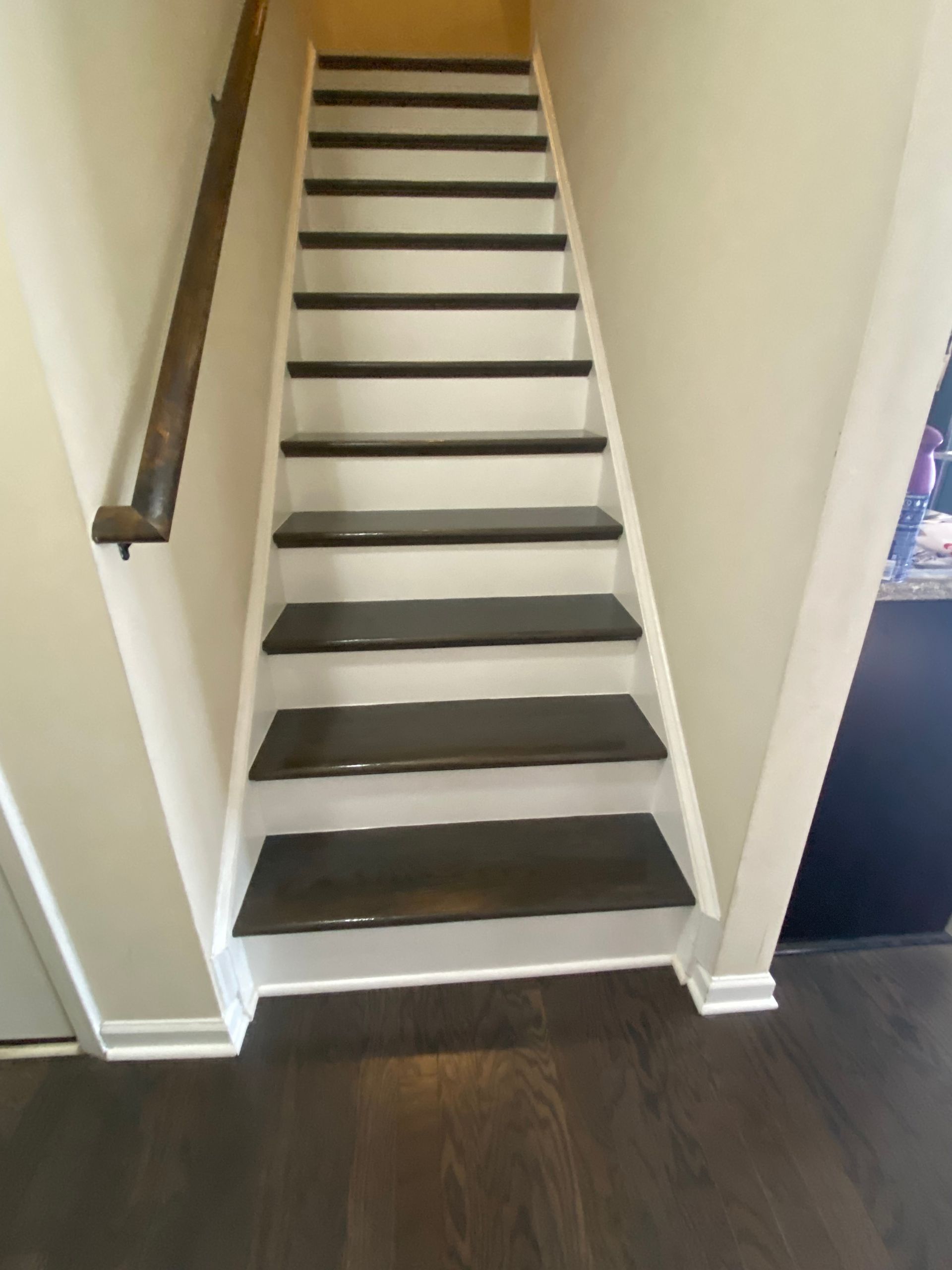 A set of stairs leading up to the second floor of a house.